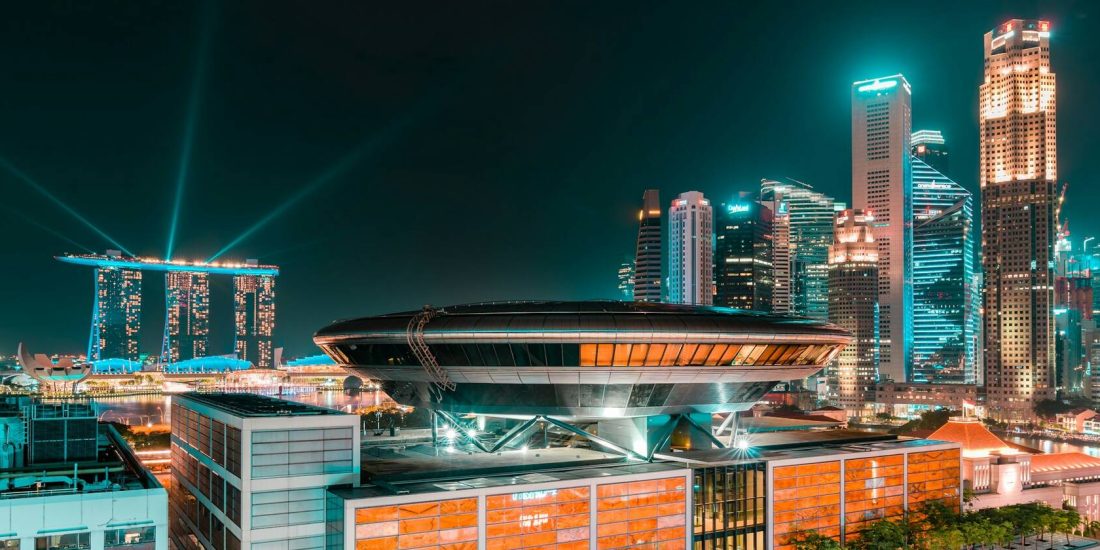 The Singapore Supreme Court and city skyline at night